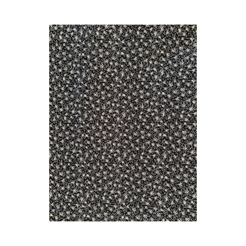 Tela Flores blancas sobre fondo negro de Indigo Fabrics